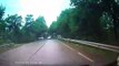 Drunk motorcyclist crashes into oncoming car trying to overtake truck in China