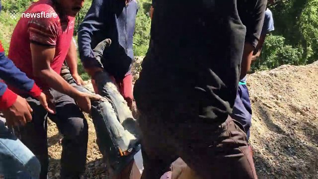 Rescuers pull survivors from wreckage of India bridge collapse