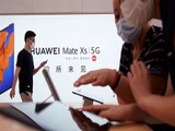 Trump administration says Huawei, Hikvision backed by Chinese military