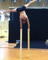 Guy Balances on Wooden Blocks While Doing Handstand