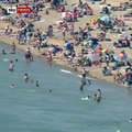 Les images surréalistes des milliers de personnes collées les unes aux autres sur les plages en Grande-Bretagne - La police obligée d'intervenir - VIDEO