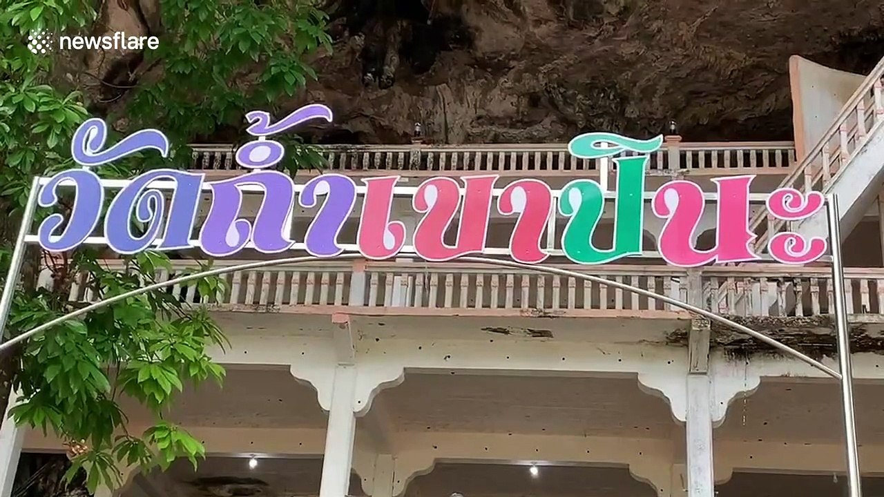 Buddhist monks furious after ancient cave is vandalised by tourists