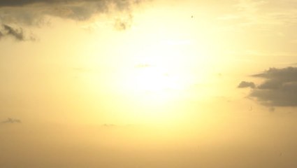 Saharan dust produces stunning beach sunset