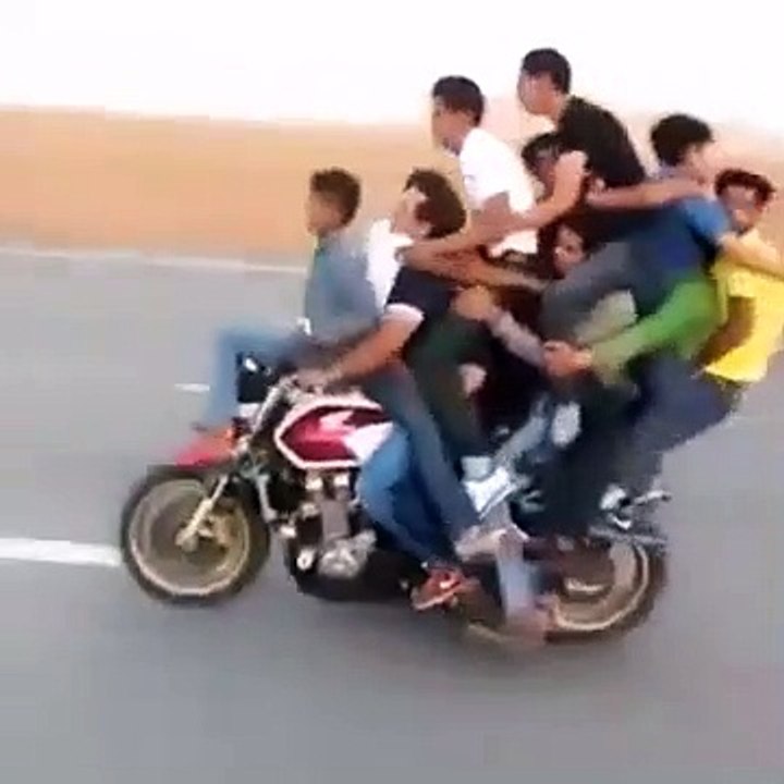 8 People On A Bike And Wheelies
