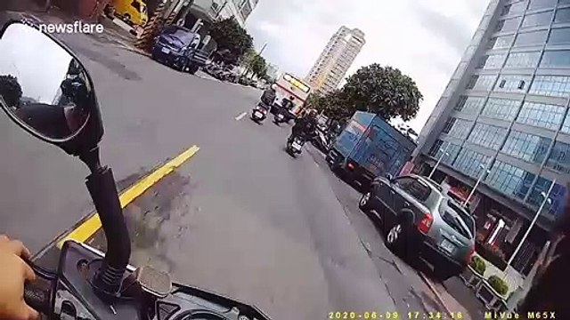Indecisive bus driver changes direction almost crushing motorcycle rider