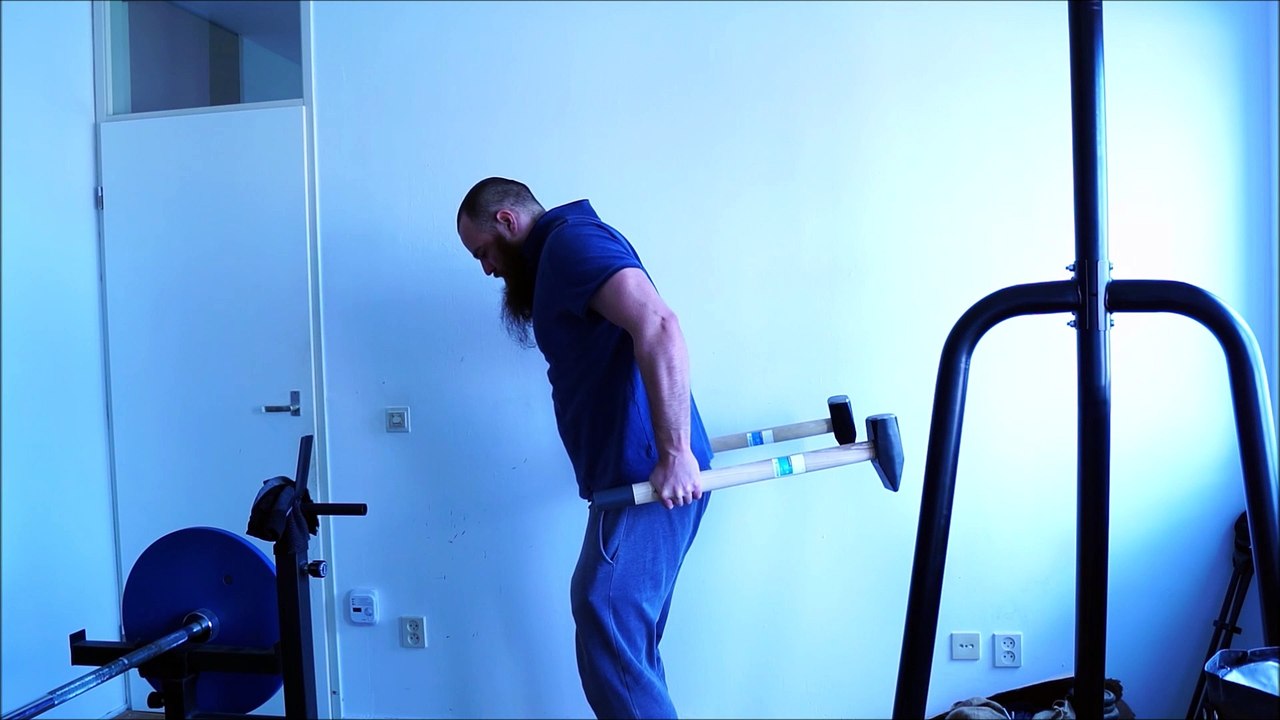Strongman and old time strongman sledgehammer levering training(s)