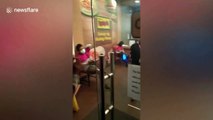 Delivery rider dances to pass the time while waiting for orders