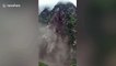 Dramatic footage of mountainside collapsing in southern China due to rainfall