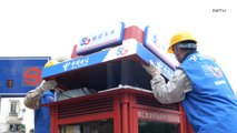 Shanghai brings public phone booths back to life as mini 5G base stations