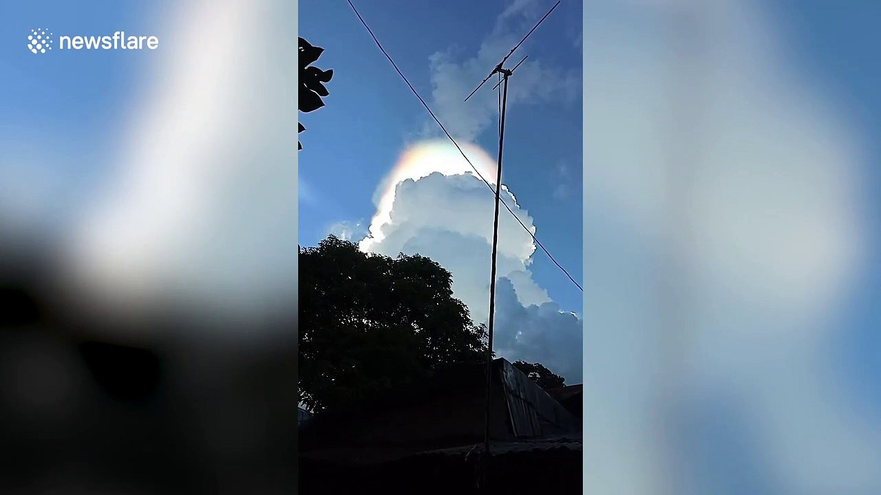 Beautiful rainbow cloud appears after storm in the Philippines