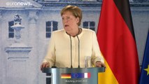 Меркель и Макрон: первая посткарантинная встреча вживую