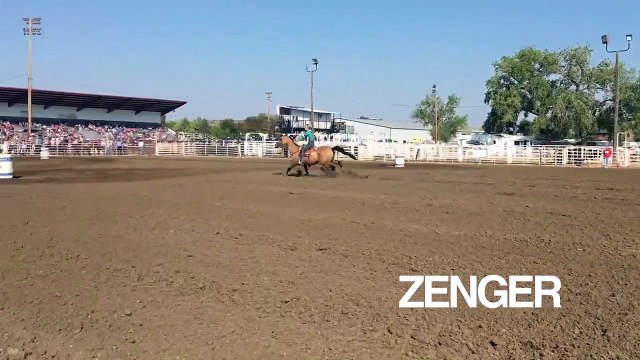 Bridget and Rocky compete in barrel racing