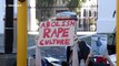 Dozens protest gender-based violence outside South Africa's Parliament