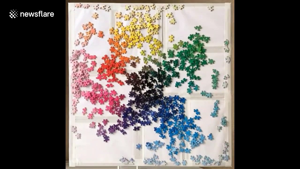 Timelapse shows satisfying process behind 1000-piece circular rainbow puzzle