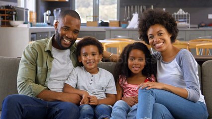 videoblocks-mother-reading-story-to-children-in-their-bedroom