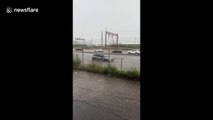 Mini Cooper gets stuck during flash flood in Atlanta