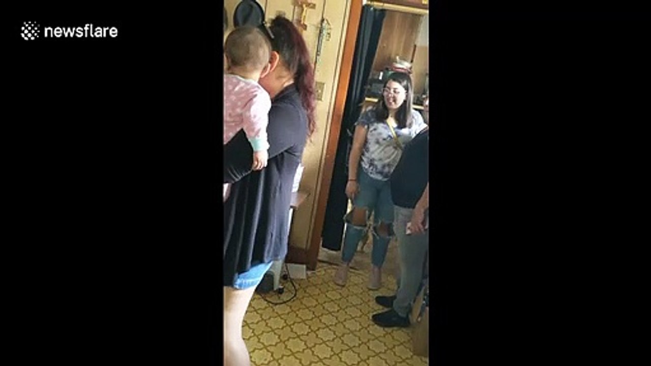 Emotional moment US woman surprises man who raised her for 30 years with adoption papers