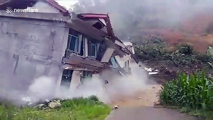 Houses collapse in central China due to landslide