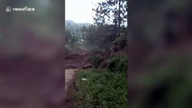 Landslide sweeps through village in the Philippines after heavy rain