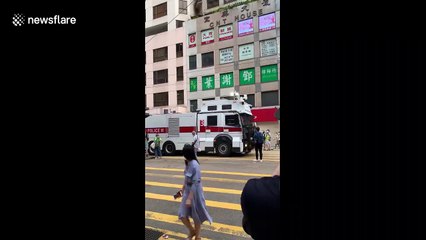 'Brave' Hongkonger gives middle finger to water cannon truck during security law protest