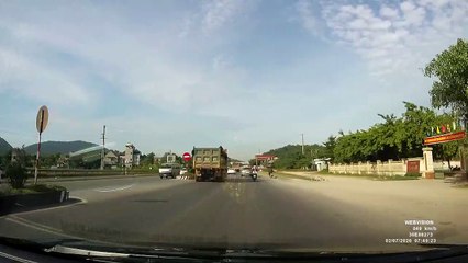Sudden Swerve Causes Motorist to Climb Curb