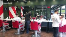 Hairdressers reopen in England for the first time in three months
