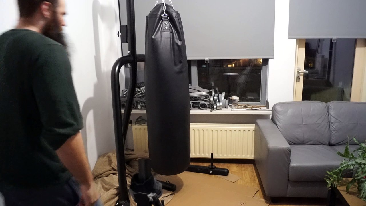 Pushing against a heavybag with the head