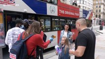 London bus tours begin again, but tourists are thin on the ground