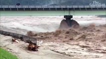 Record rainfall triggers floods and landslides in Japan