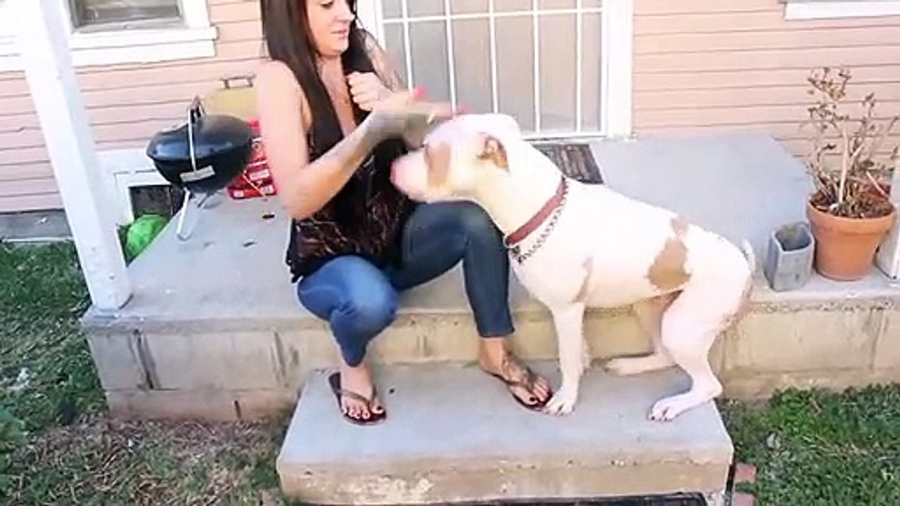 Tattoo model with her dog outside