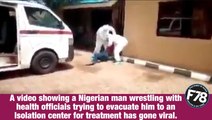 F78NEWS: Nigerian man wrestles with health officials trying to evacuate him to an isolation center.
