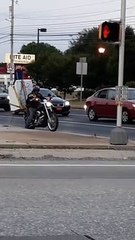 Transporting a Washing Machine with a Motorcycle