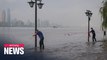 Heavy rain raises flood alert levels for cities on Yangtze River