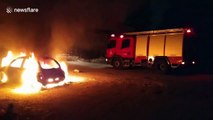 Car catches fire and is engulfed in flames in Athens, Greece