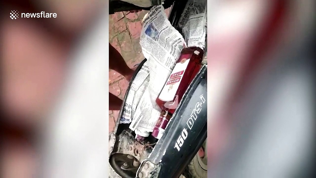 Police seize several alcohol bottles from bootlegger in northern India