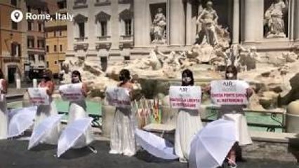 Women protest against postponed weddings