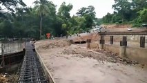 Road submerged after heavy rain causes flash floods in northern Thailand