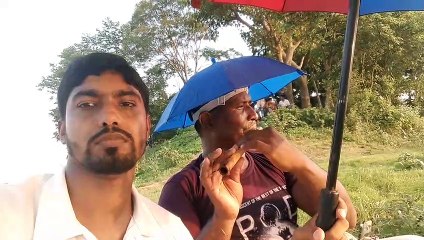 Heart touching Flute play beside the river Titas. Piping in the bank of river. Bamboo piping.