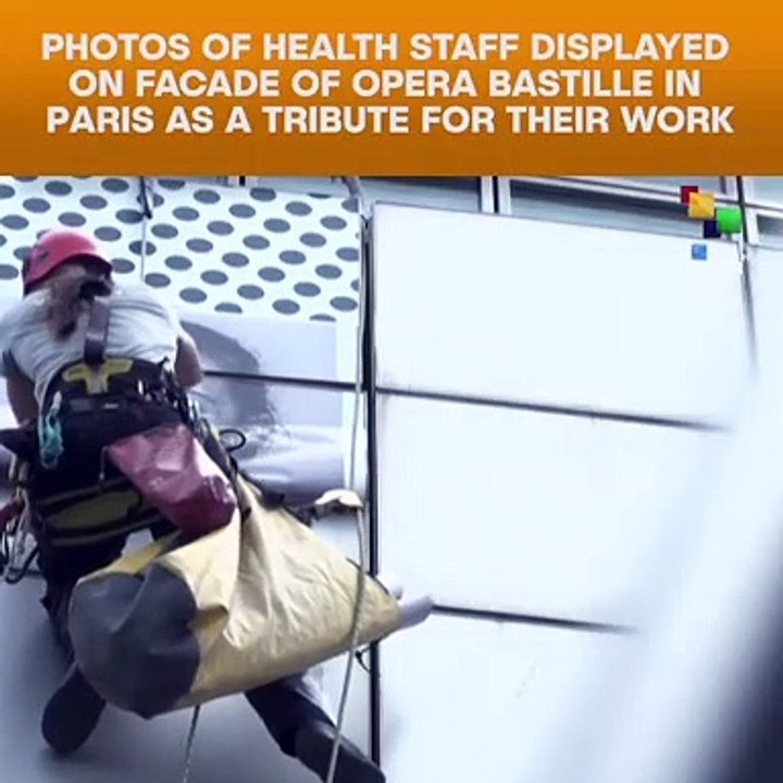 Photos Of Health Staff Displayed On Facade Of Paris Opera