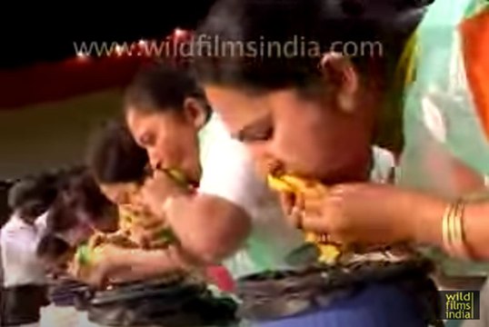 Messy mango eating competition