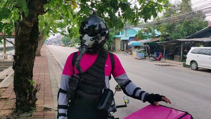Food delivery rider has fighter pilot helmet