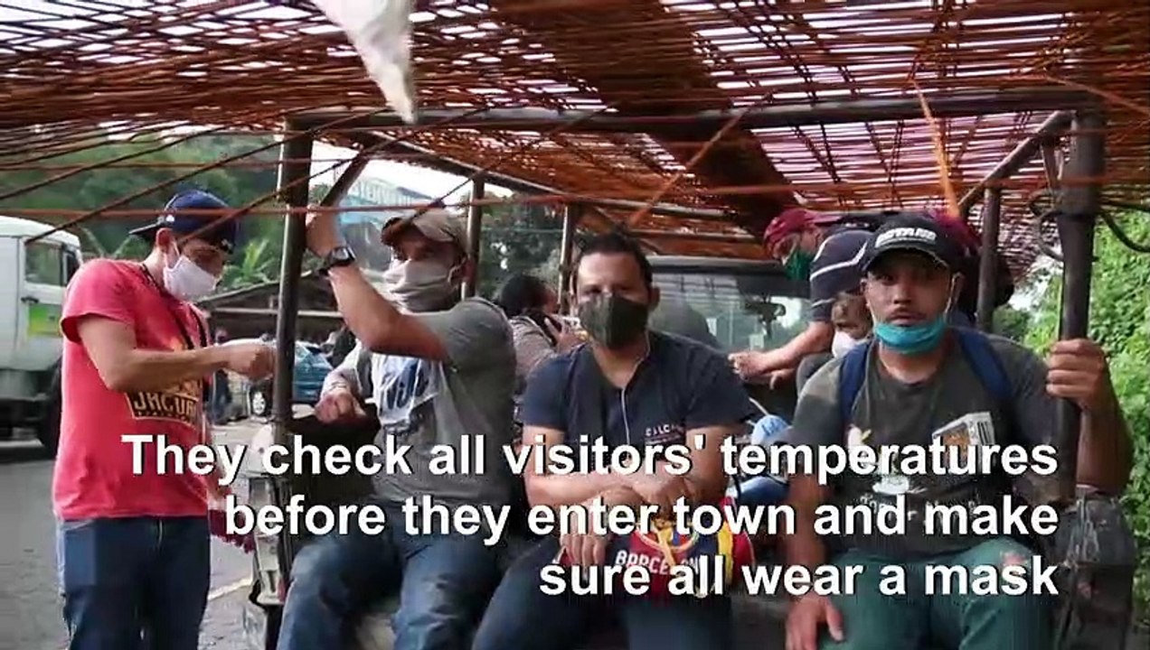 Armed patrolmen in Guatemalan town help fight pandemic