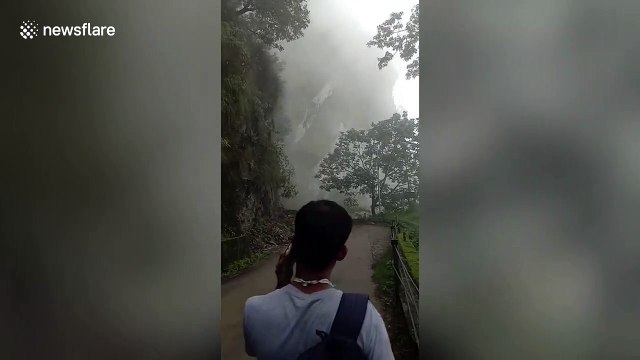 Rockslide in India sends boulders crashing down onto mountain road