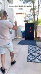 Guy Showcases Knife Throwing Skills by Busting Two Balloons at Once