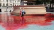 Animal rights activist pours red dye in Trafalgar Square fountain