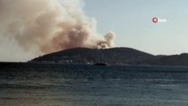 İstanbul Heybeliada'da orman yangını çıktı. Yangına karadan ve havadan ekipler tarafından müdahale ediliyor