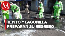 Comerciantes de Tepito y la Lagunilla limpian banquetas para reapertura de negocios