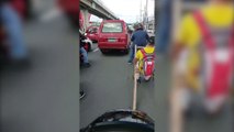 Brothers use wooden sleigh to dodge moto pillion ban