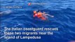 Italian coastguard rescues migrants from waves near Lampedusa