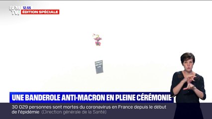 "L'économie nous coûte la vie": une banderole anti-Macron en peine cérémonie du 14-Juillet
